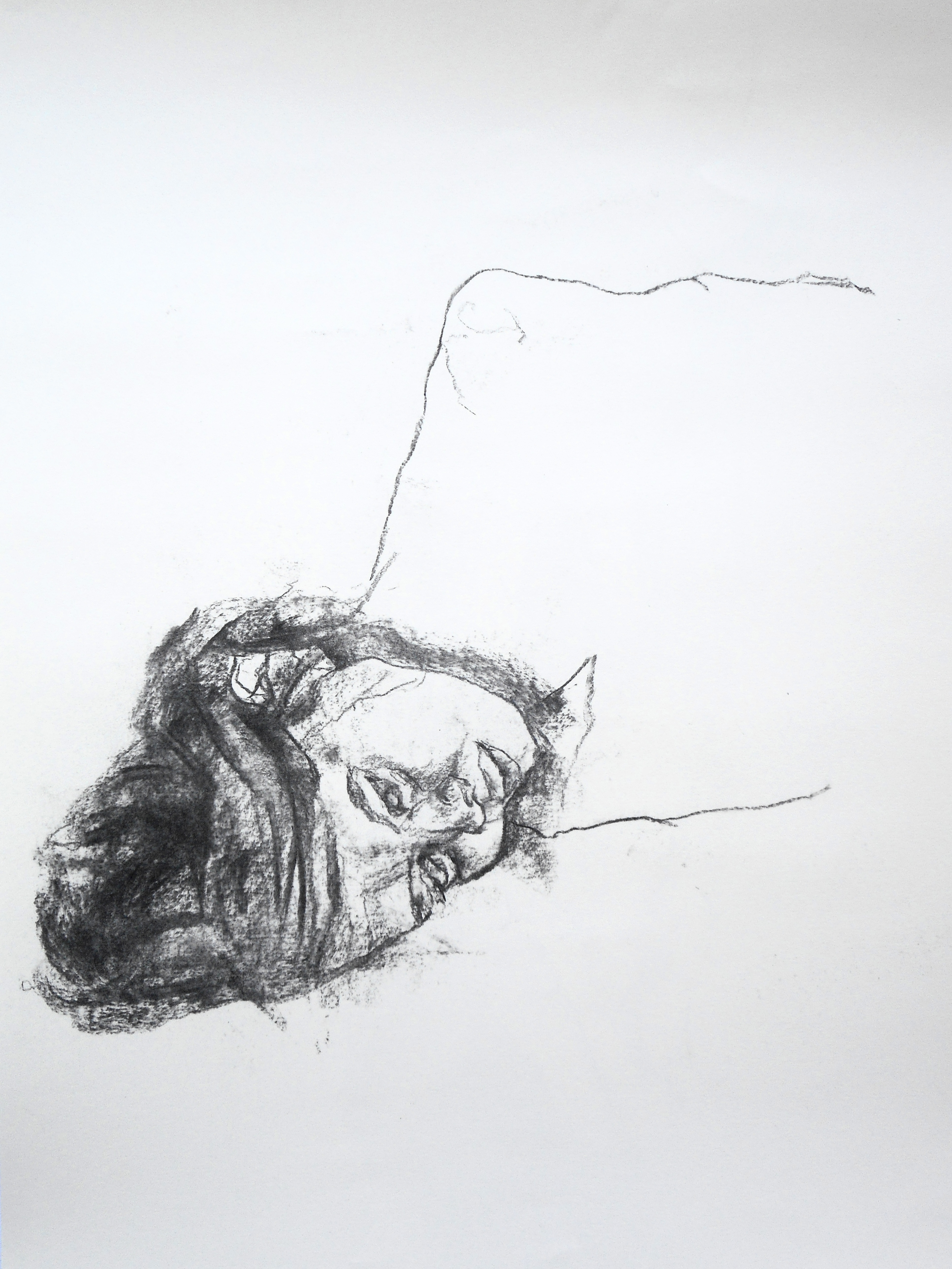 A woman lying on her side whose body is not yet drawn.